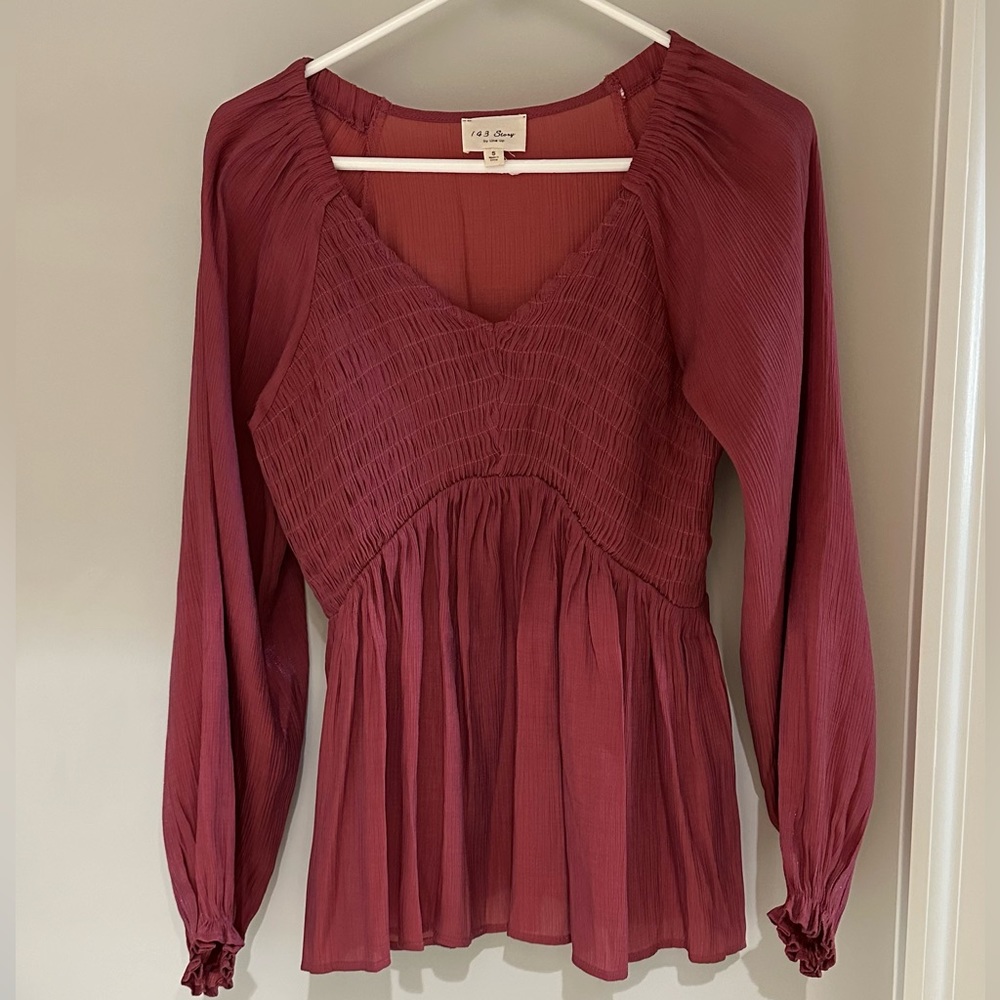 Reddish pink top